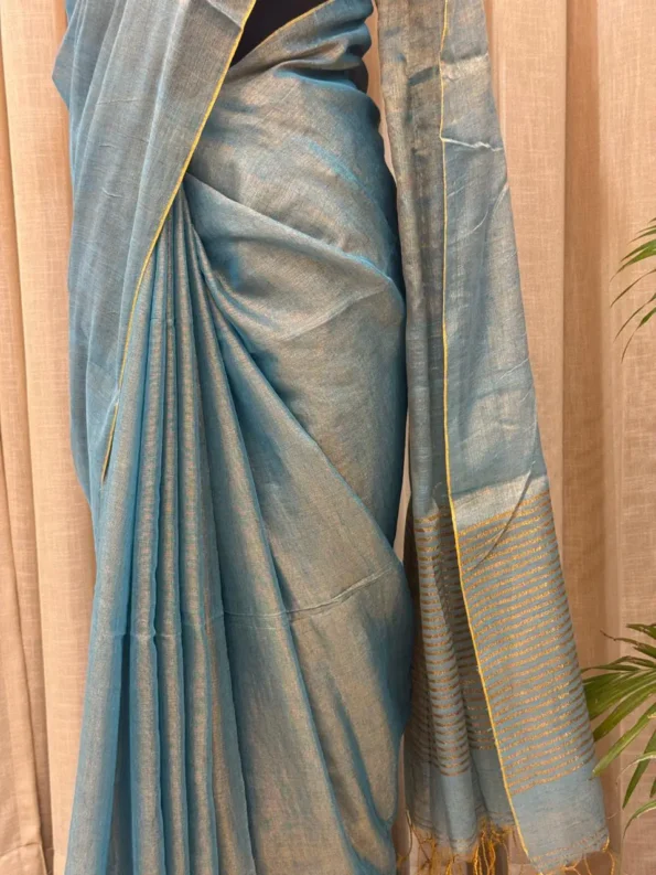 Premium Khadi Tissue Saree handwoven with golden zari border – Shriyyum