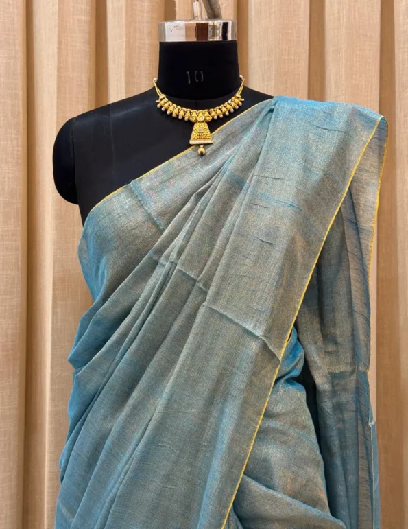 Premium Khadi Tissue Saree handwoven with golden zari border – Shriyyum