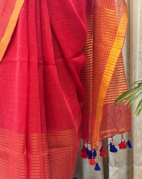 Red Linen Cotton festive saree with golden zari border and striped pallu – Shriyyum